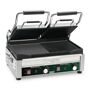 Waring Commercial Dual Grill - Half Panini and Half Flat Grill - 240-Volt (17 in. x 9.25 in. cooking surface), Silver Make all your signature sandwiches and more with the 240V Waring; WDG300 Double Italian-Style Panini/Flat Grill. Combination flat/ribbed cast-iron plates heat evenly and quickly cook sandwiches, burgers, chicken, and vegetables up to 3 in. thick. The brushed stainless steel body and removable drip tray are easy to clean. Includes adjustable thermostat to 570˚F plus POWER and READY indicator lights. Color: Silver. 