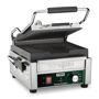 Waring Commercial Panini Perfetto Compact Panini Grill - 208-Volt (9.75 in. x 9.25 in. Cooking Surface), Silver Make perfectly grilled panini sandwiches and more with the 208V Waring WPG150B Compact Italian-Style Panini Grill. Grooved cast-iron plates heat evenly and quickly to cook sandwiches, burgers, chicken, and vegetables up to 3  thick. Its brushed stainless steel body and removable drip tray are easy to clean. Includes adjustable thermostat to 570°F along with POWER and READY indicator lights. Color: Silver. 
