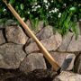 Garrett Wade Long Handled Hoe The Stand-up Hoe is a great, back-saving tool to help prepare your plant beds in Spring. The shorter Half-Hoe does the same job, but works better in small areas, while seated or kneeling, and for planting in raised beds. Use either for turning over soil and mixing in compost or peat. The Half-Hoe has an ergonomic shaped handle. The Stand-up Hoe handle flares near the head for strength, but narrows at the other end for an easier grip. The heads of each tool are the same, both 8 long x 4 wide. Han 