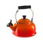 Le Creuset Whistling Tea Kettle - Size: unisex Whistling kettle of heavy-gauge carbon steel. Vibrant porcelain enamel finish. Quick heating with harmonic whistle. Heat resistant handle. Limited 5 year warranty. Dishwasher safe. Imported. 