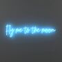 yellowpop Fly me to the moon - LED neon sign Fly me to the moonRelive Rat Pack Las Vegas with this Frank Sinatra inspired neon sign. More than 50 years later, the crooner's famous lyrics still sound just as smooth. Hang our Fly Me to the Moon neon sign, pour a martini, and transport to another time. Size shown: 36 x 8 in (92 x 20 cm)Color shown: Light Blue Designed to shine Song lyric neon sign Blue LED neon tubing Transparent hollow out backing 