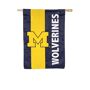 EVERGREEN ENTERPRISES INC University of Michigan Mixed-Material Embellished Appliqué House Flag Cheer for your favorite team in style with the help of this mixed-material, double-sided appliqué house flag. It's the must-have for any sports fan. Our appliqué flags were first introduced more than 20 years ago, and thanks to their bold designs and top-of-the-line materials, they continue to be just as popular today. Each mixed-material embellished flag is made of strong 310 denier nylon to withstand all types of weather. We combine pieces of fade-resistant fabric with tight, det 