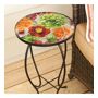 EVERGREEN ENTERPRISES INC Summer Splash Round Glass Table Reds, oranges, and pinks are not just surrounded by lush greenery in your garden bed. The Summer Splash Round Glass Table shows off these bright colors on the blooms of its table-top. With an embossed and painted glass top on a black painted metal frame, this accent table is both durable and beautiful. A truly unique and colorful glass table! 
