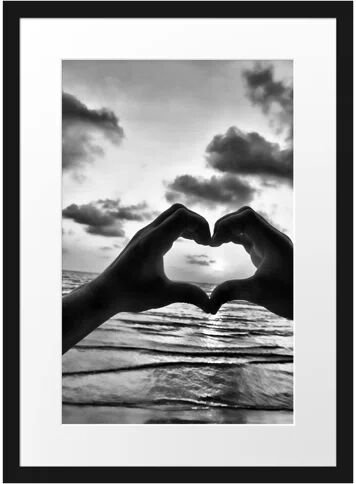 East Urban Home Heart Shaped by Hands by the Sea Framed Photographic Print Poster East Urban Home Size: 55 cm H x 40 cm W  - Size: 38cm H x 30cm W