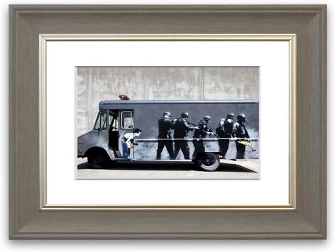 East Urban Home 'Banksy Swat Truck Cornwall Banksy' Framed Photographic Print East Urban Home Size: 93 cm H x 70 cm W, Frame Options: Grey Brushed  - Size: 50 cm H x 70 cm W