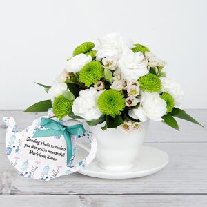 www.flowercard.co.uk White Spray Roses, Lime Santini, White Waxflower, Rustic Ruscus inside Bone China Teacup and Saucer