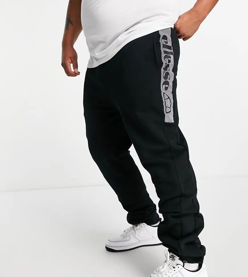 ellesse plus joggers with reflective branding in black  Black