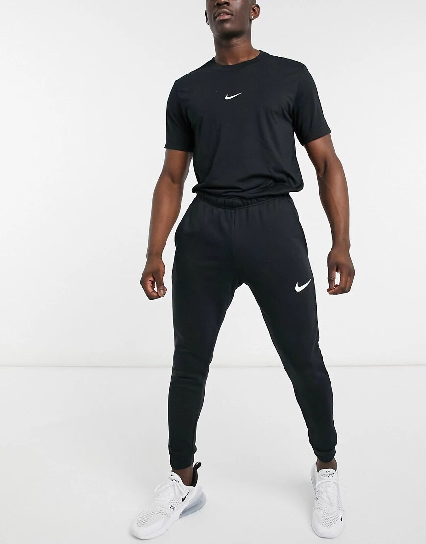 Nike Training Dri-FIT tapered fleece joggers in black  Black