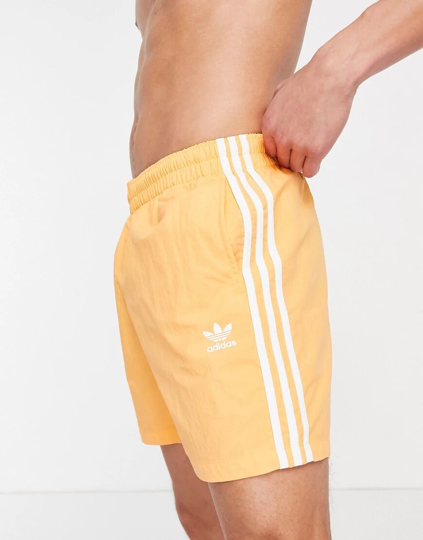 adidas Originals adicolor three stripe swim shorts in orange  Orange