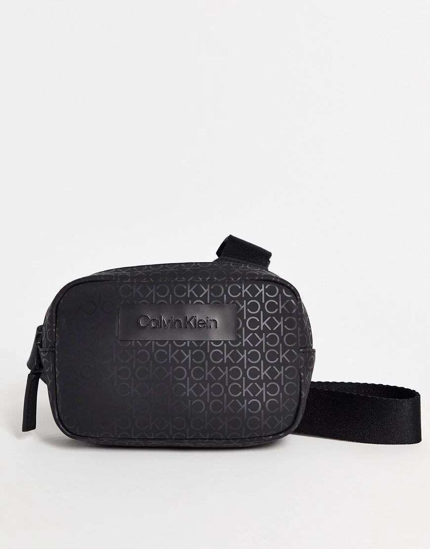 Calvin Klein Calvn Klein monogram print harness bag in black  Black