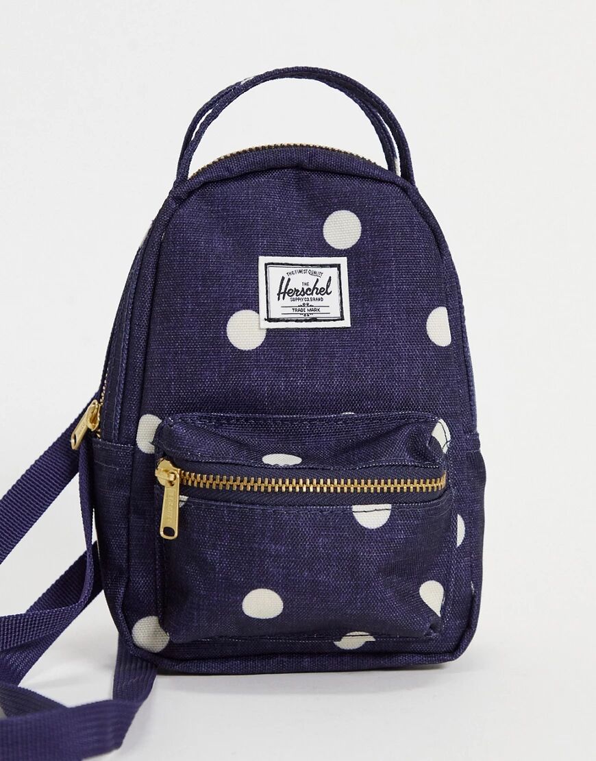 Herschel Supply Co Herschel mini backpack in denim blue with white polka dots and cross body strap  Blue