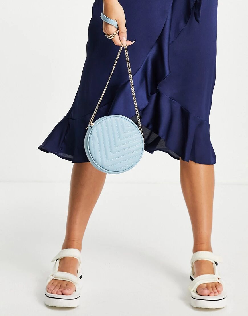 Truffle Collection circle quilted cross body in blue  Blue