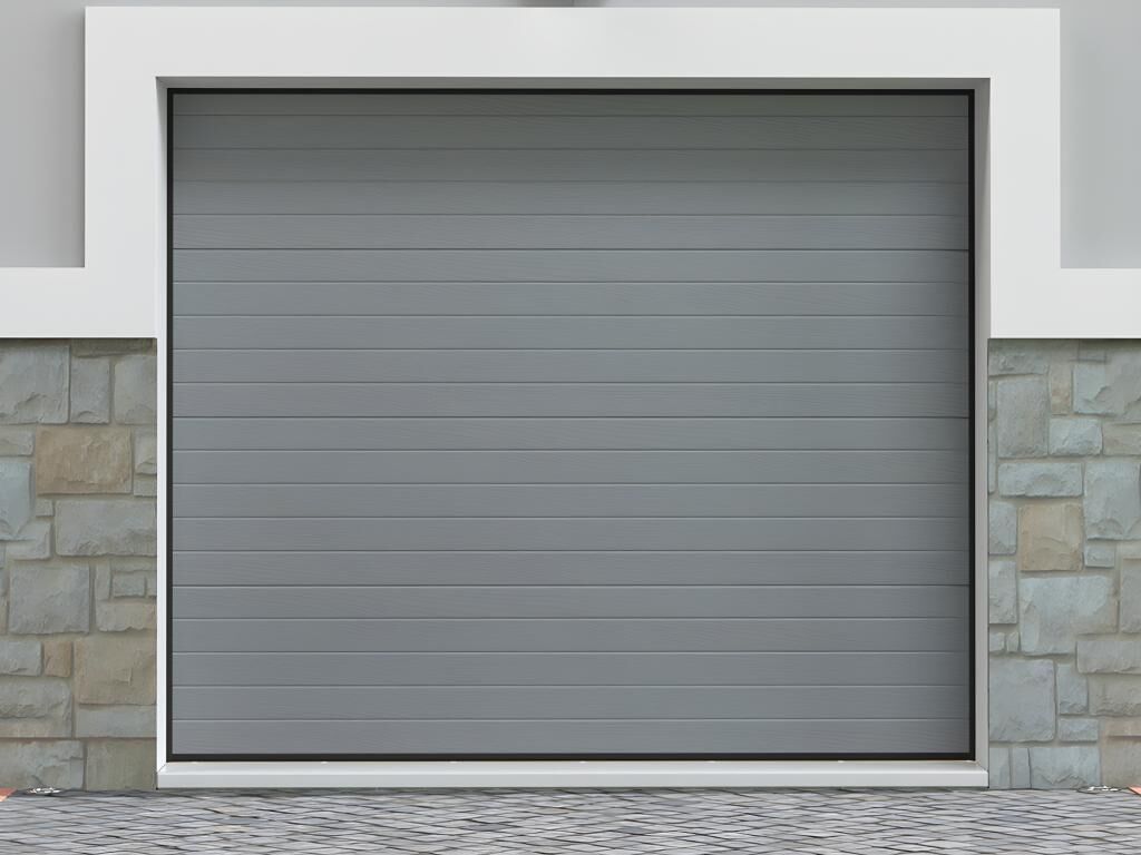 Unique Puerta de garaje seccional efecto ranurado gris motorizada - NORIA