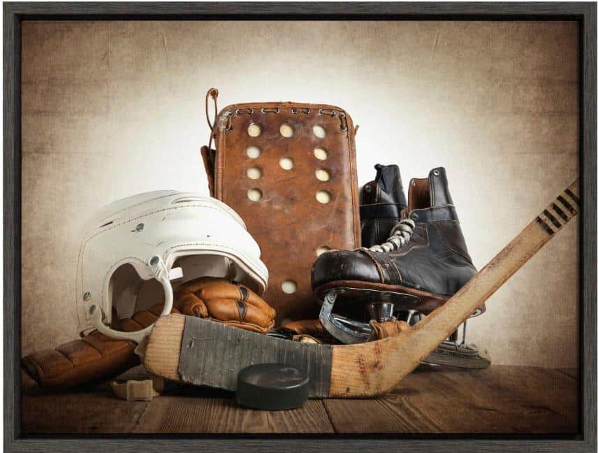 DesignOvation Sylvie "Vintage Hockey Gear" by Saint and Sailor Studios 24 in. x 18 in. Framed Canvas Wall Art