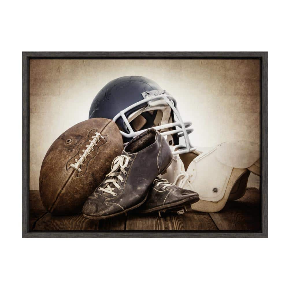 DesignOvation Sylvie "Vintage Football Gear" by Saint and Sailor Studios Sports Framed Canvas Wall Art 24 in. x 18 in.