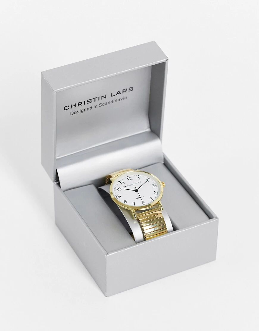 Christin lars gold watch with white dial  Gold