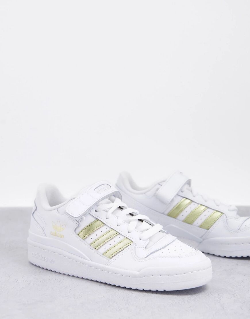 adidas Originals Forum Low trainers in white with gold stripes  White