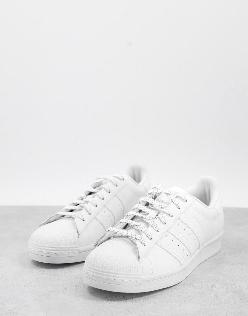 adidas Originals Superstar trainers in white with lace detail  White