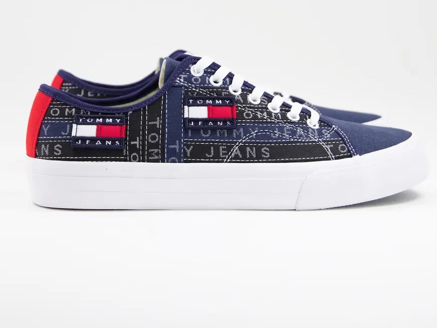 Tommy Jeans trainer with all over flag logo in navy  Navy