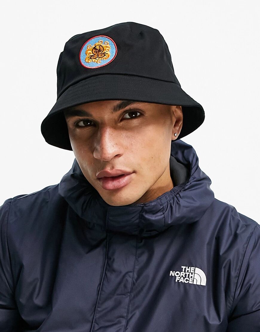ASOS DESIGN bucket hat in black with 70's lion embroidery  Black