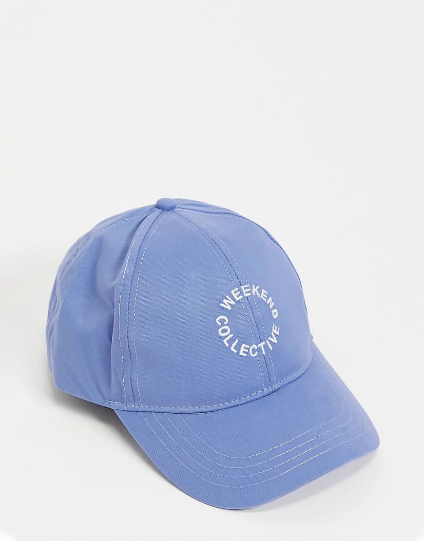 ASOS Weekend Collective baseball cap with logo in blue  Blue