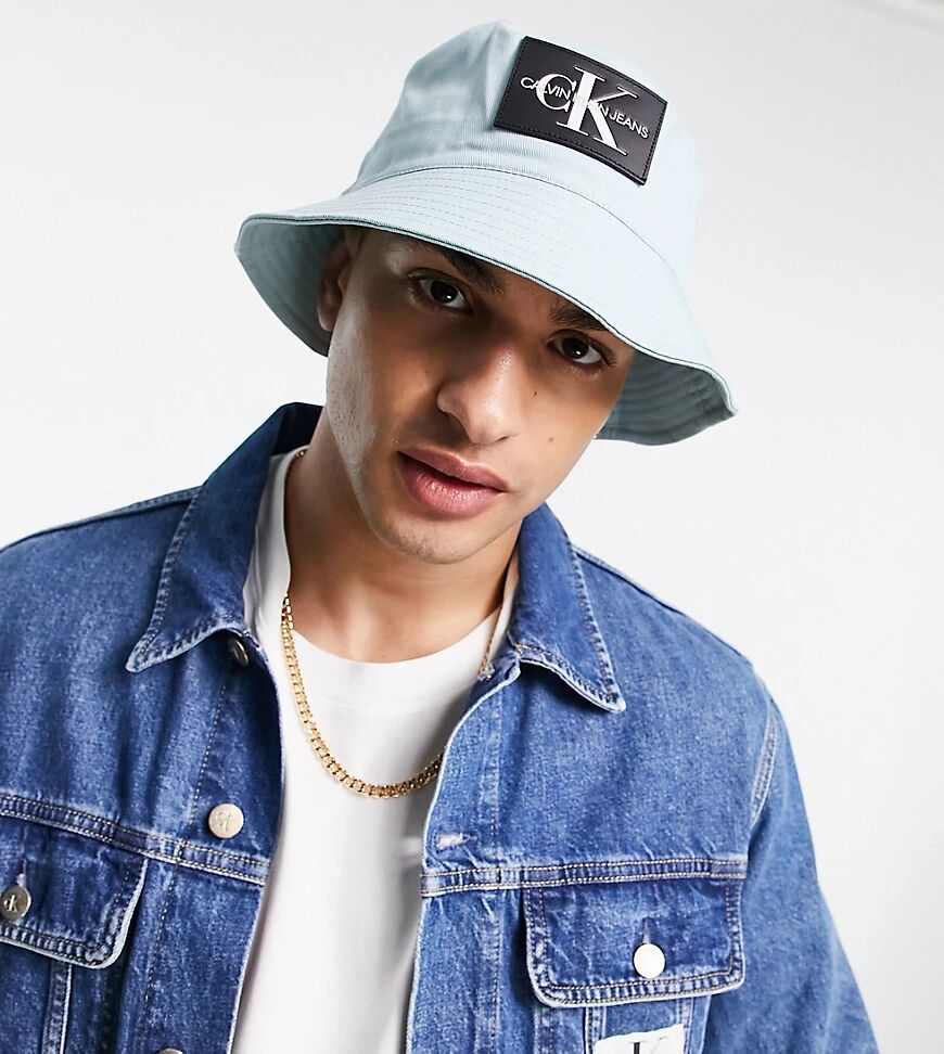 Calvin Klein Jeans ASOS exclusive monogram badge bucket hat in blue  Blue