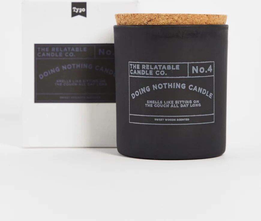 Typo candle with slogan 'couch all day' in black  Black