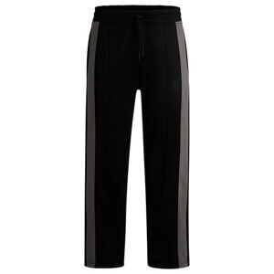 HUGO x RB oversized-fit trousers with tape and signature bull icon