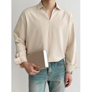 Chemise pour homme à col à revers et manches longues de couleur unie et ample