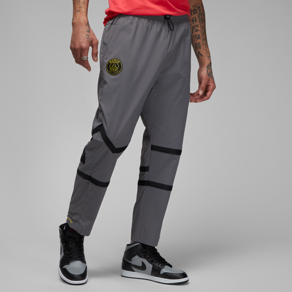 nike pantaloni in tessuto paris saint-germain - uomo - grigio