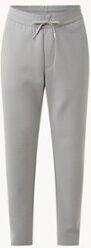 Armani Exchange Tapered fit cropped joggingbroek met logo in reliëf - Lichtgrijs