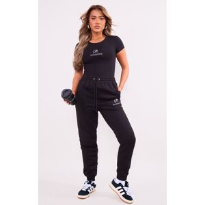 PrettyLittleThing PRETTYLITLETHING Jogging retroussé noir à taille haute et logo argenté, Noir - Publicité