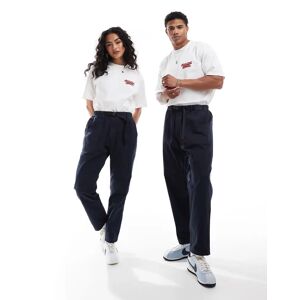 - Pantalon large unisexe striÃ© en coton coupe fuselÃ©e - Bleu marine Bleu marine L unisex