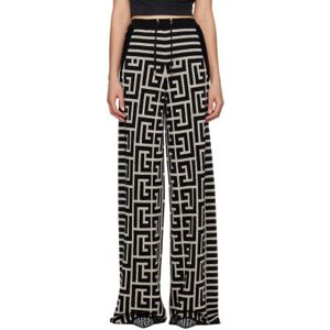 Balmain Pantalon de détente noir à monogrammes - FR 34 - Publicité