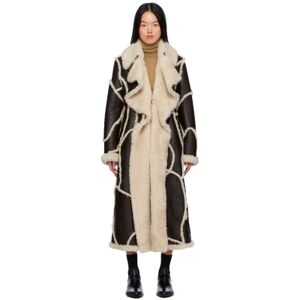 Chloé Manteau noir et blanc à garnitures en peau retournée et à patchwork - FR 36 - Publicité