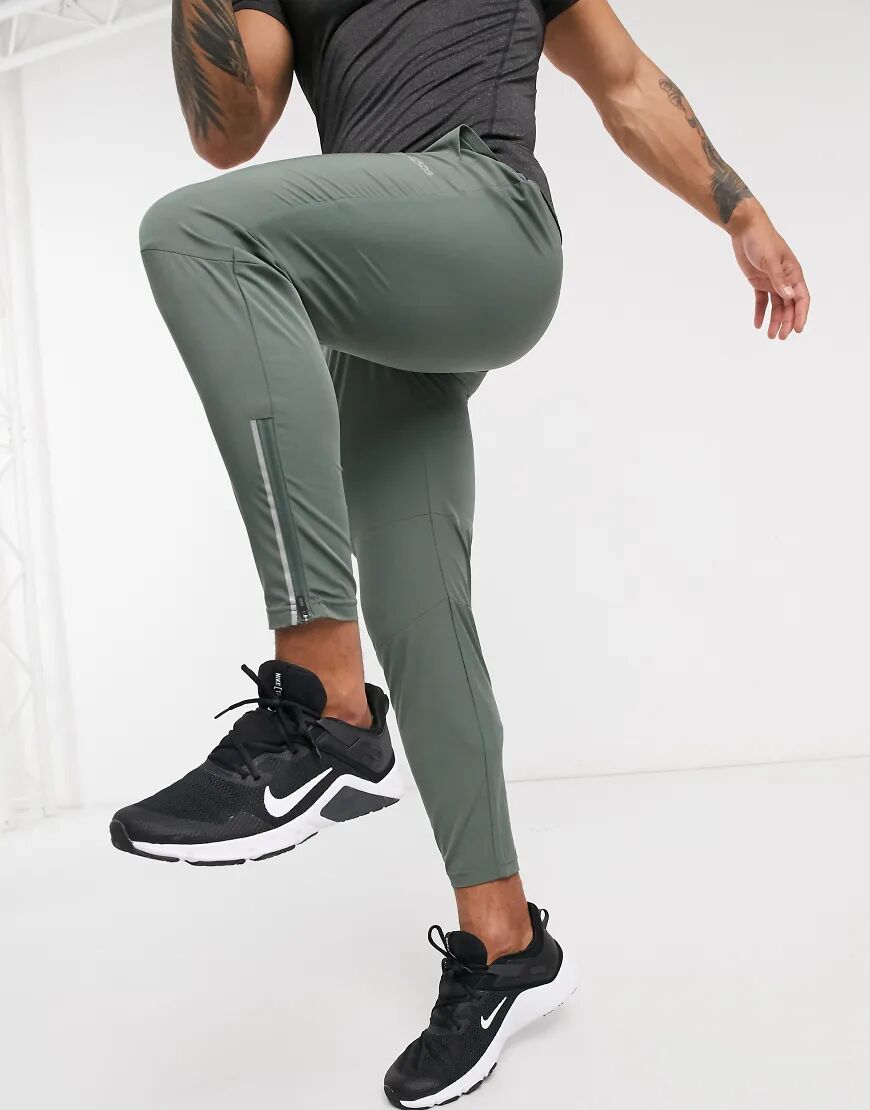 ASOS 4505 woven skinny tapered running joggers with reflective zip detail in khaki-Green  Green