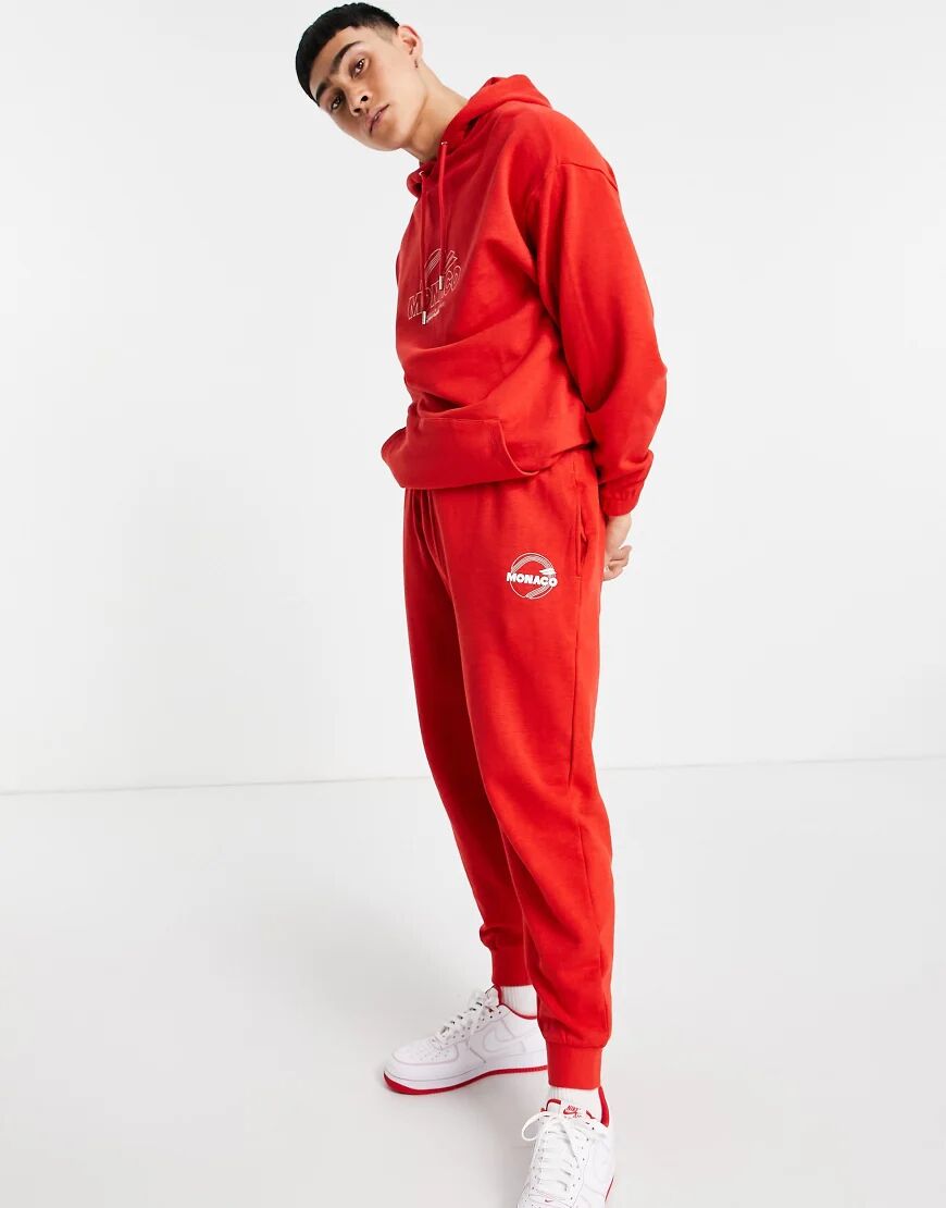 ASOS DESIGN co-ord oversized joggers in red marl with Monaco city print  Red