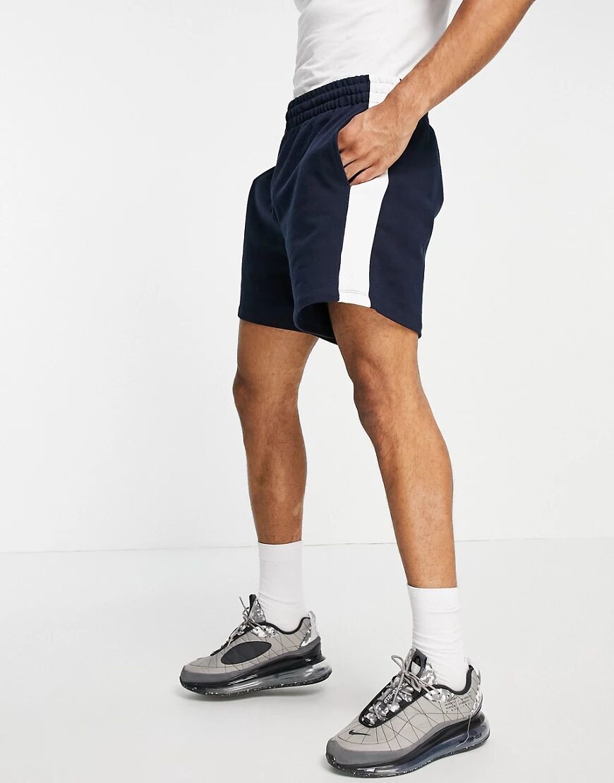 ASOS DESIGN oversized jersey shorts with side stripe in navy  Navy