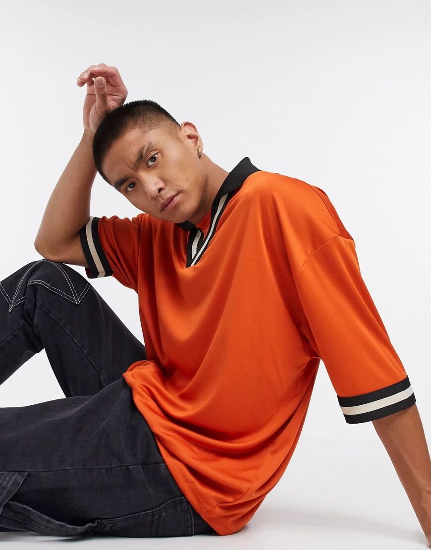 ASOS DESIGN oversized polo shirt with retro neck tipping in high shine fabric-Orange  Orange