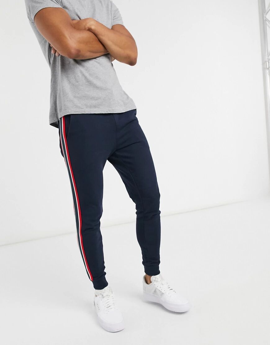 ASOS DESIGN skinny joggers with side stripe in navy  Navy