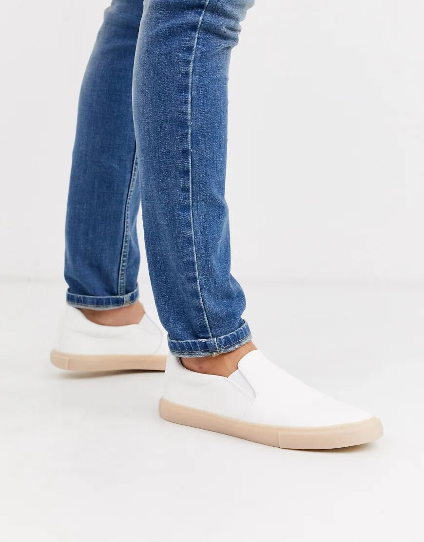 ASOS DESIGN slip on plimsolls in white leather look with gum sole  White