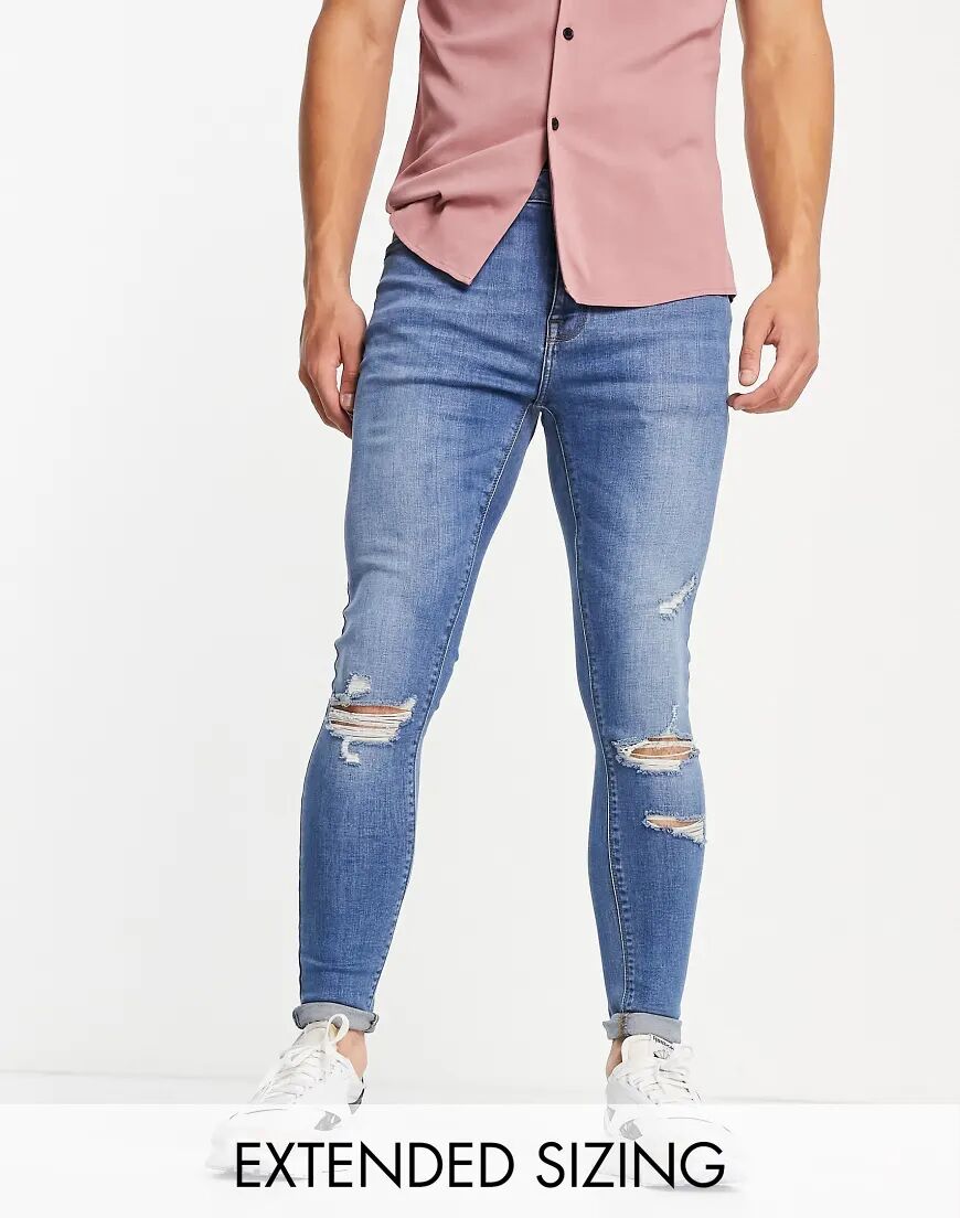 ASOS DESIGN spray on jeans with power stretch in mid wash with rips-Blue  Blue