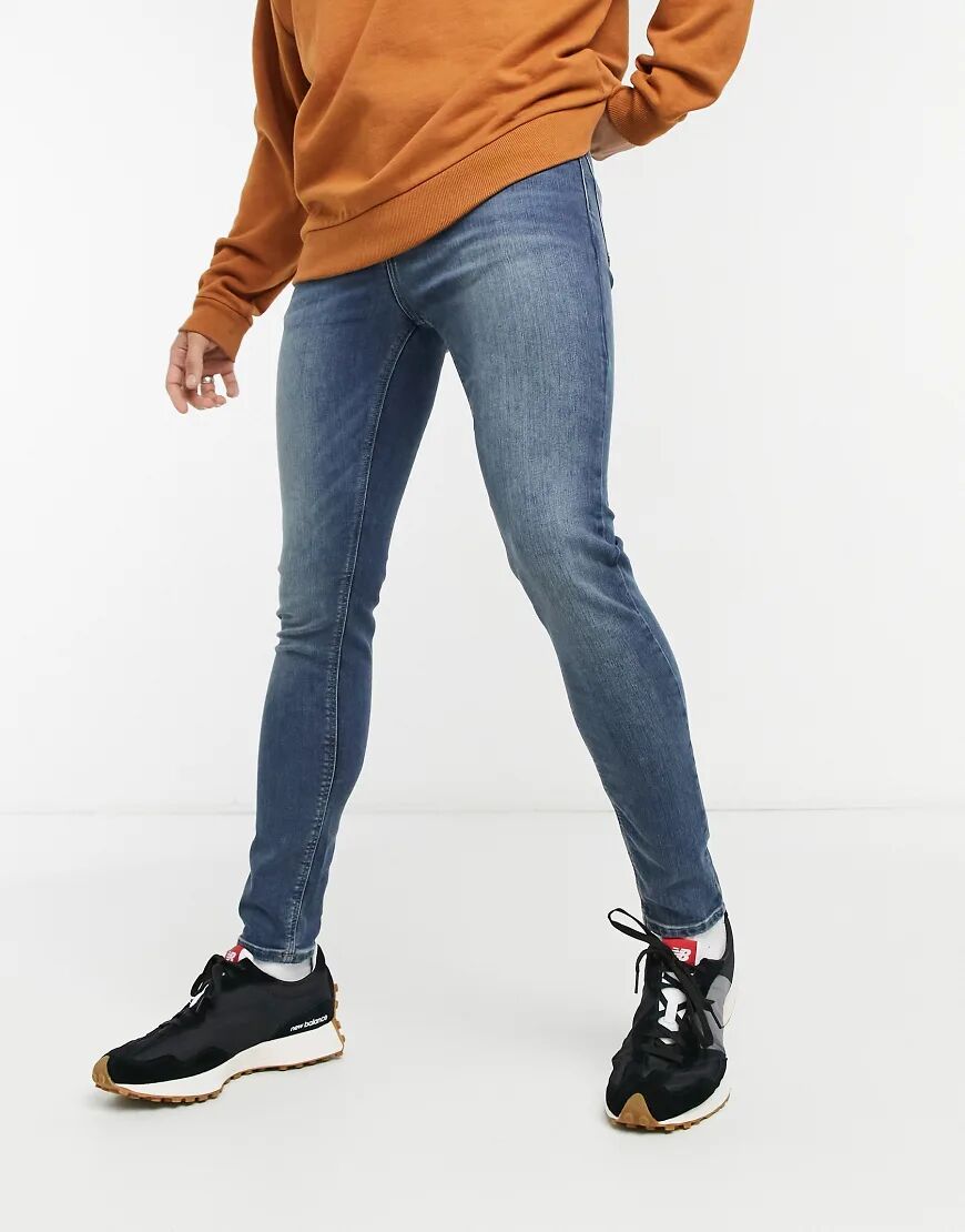 ASOS DESIGN spray on jeans with power stretch in vintage dark wash-Blue  Blue