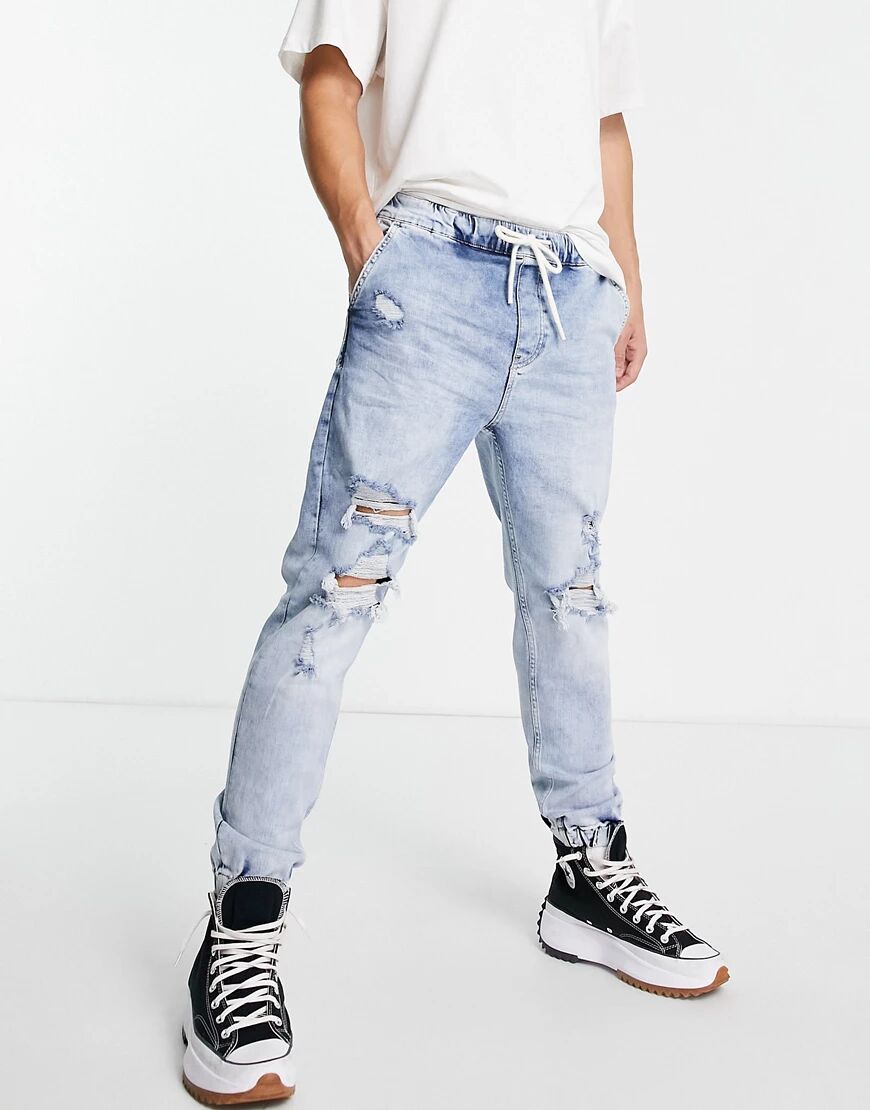 Bershka tapered jeans in mid blue  Blue