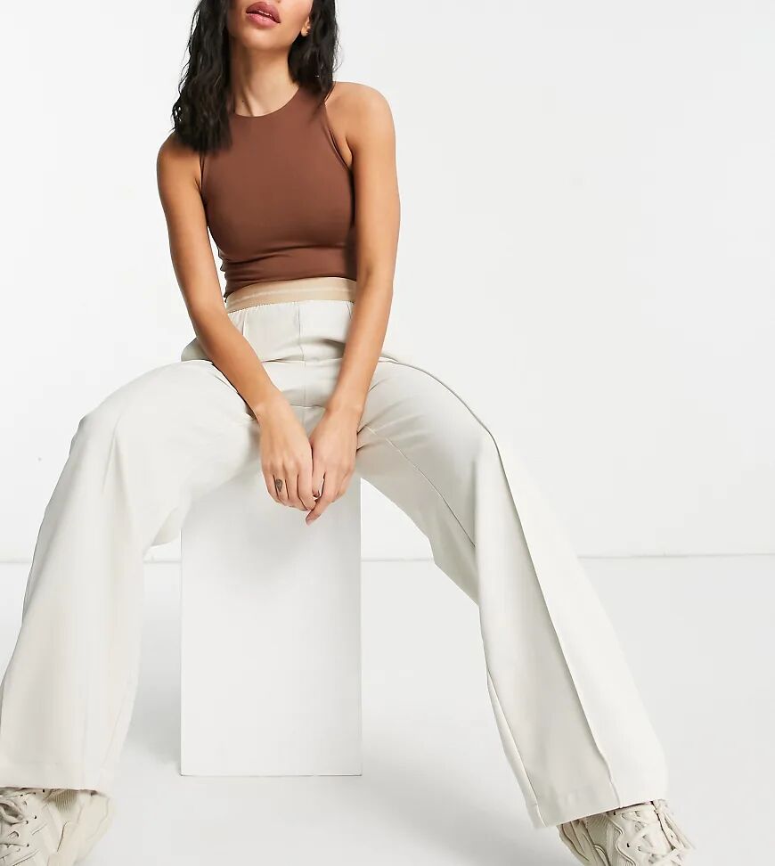 COLLUSION Unisex 90's wide leg trousers in off white  White