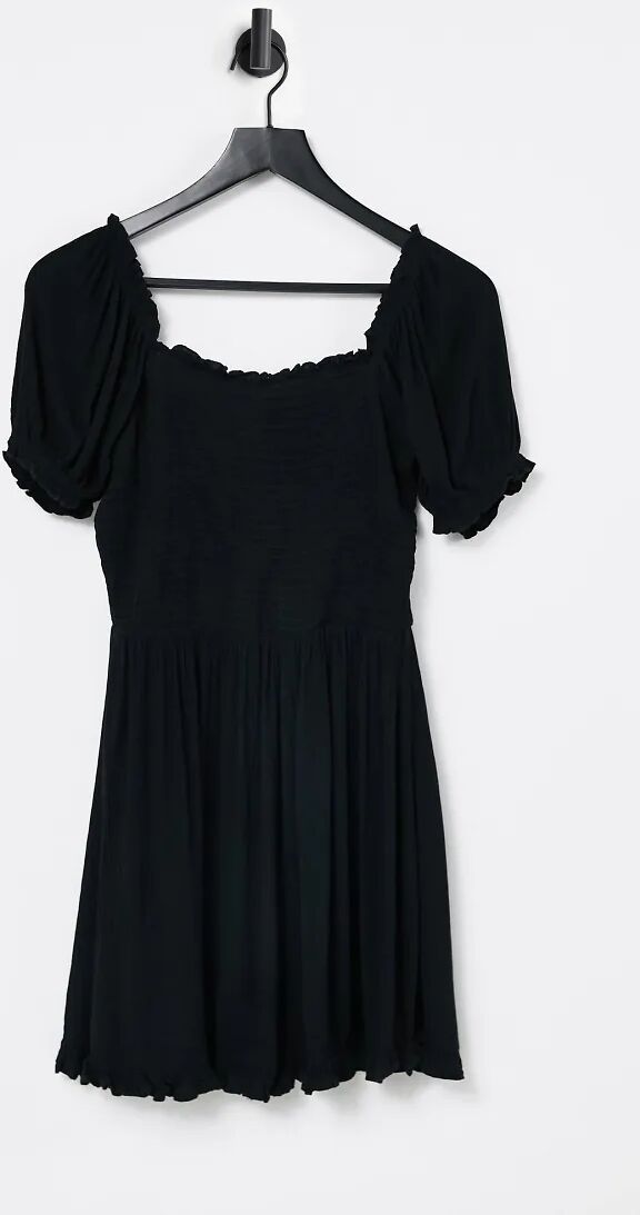 Iisla & Bird Exclusive mini shirred beach dress in black  Black