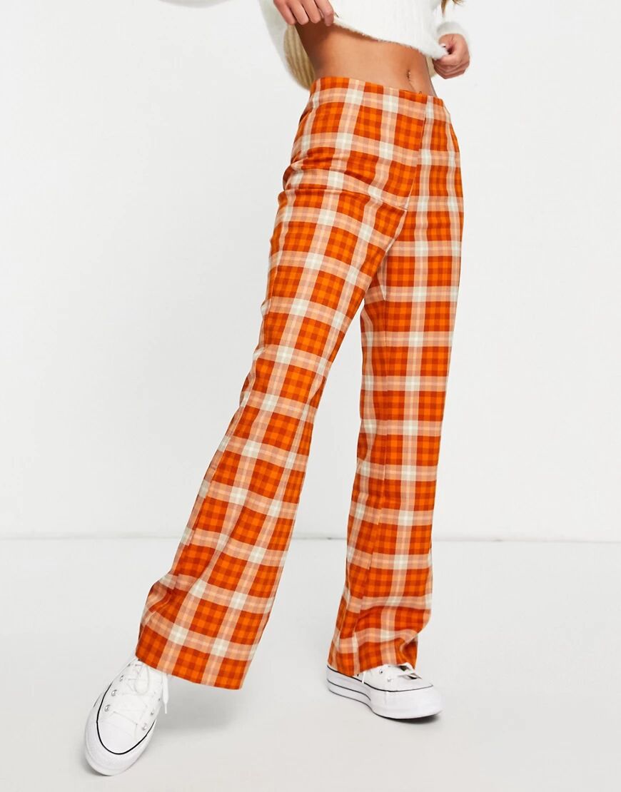 Monki recycled check flare trousers in rust-Red  Red