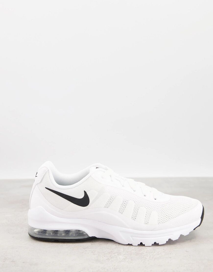 Nike Air Max Invigor trainers in white and black  White