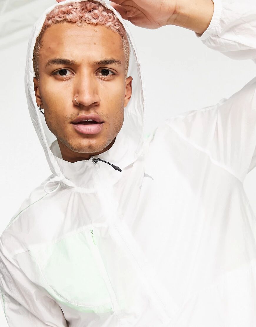 Puma Running lite woven jacket in white  White