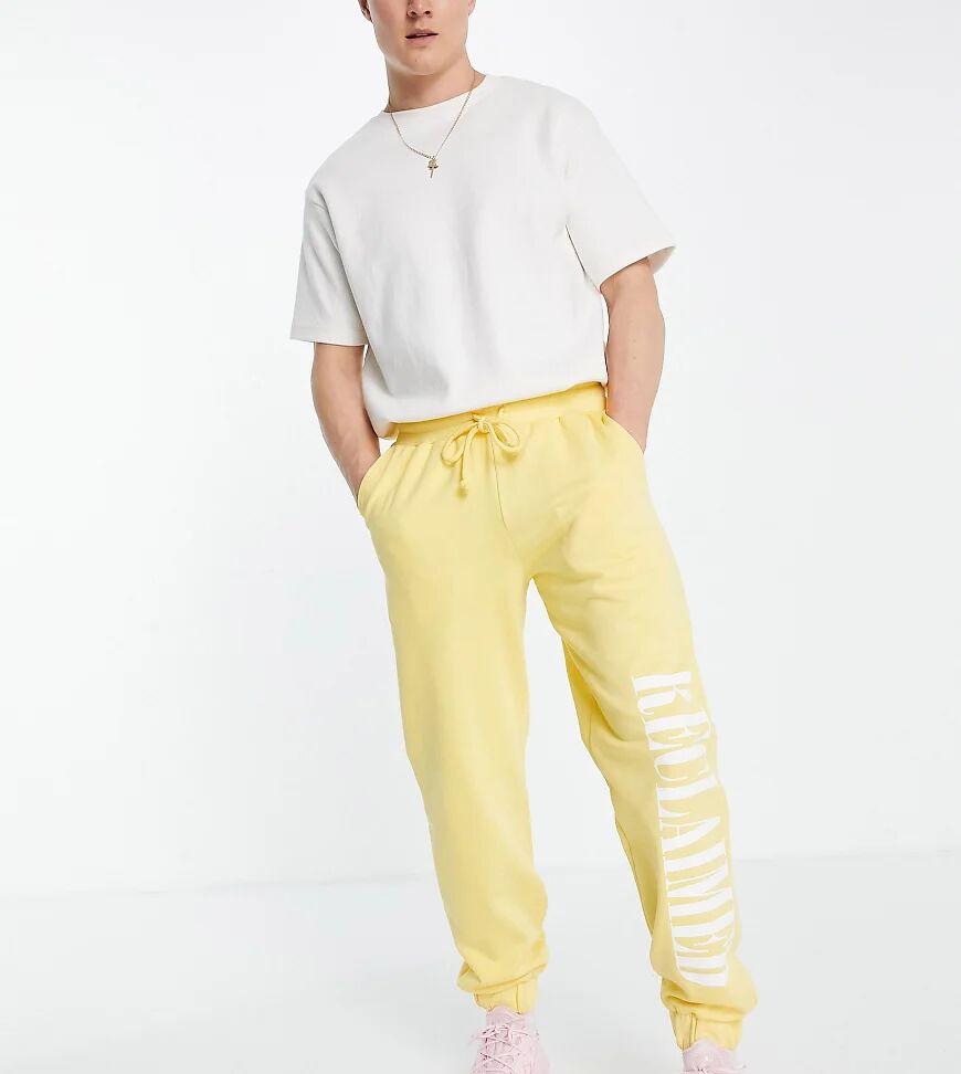 Reclaimed Vintage inspired logo joggers in yellow  Yellow